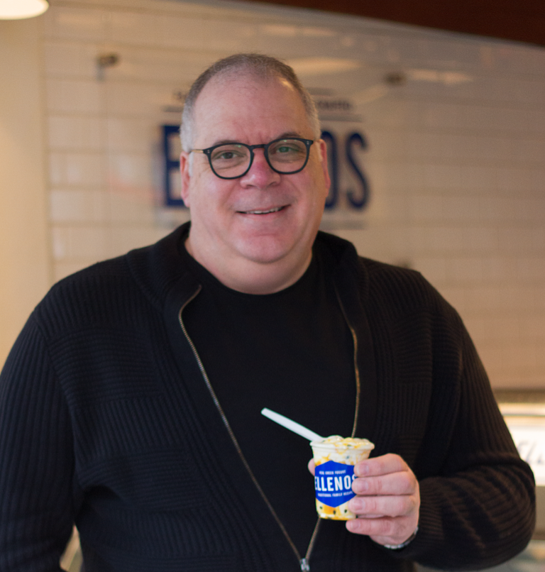 Co-founder: Con Apostolopoulos holding a cup of Ellenos Greek yogurt